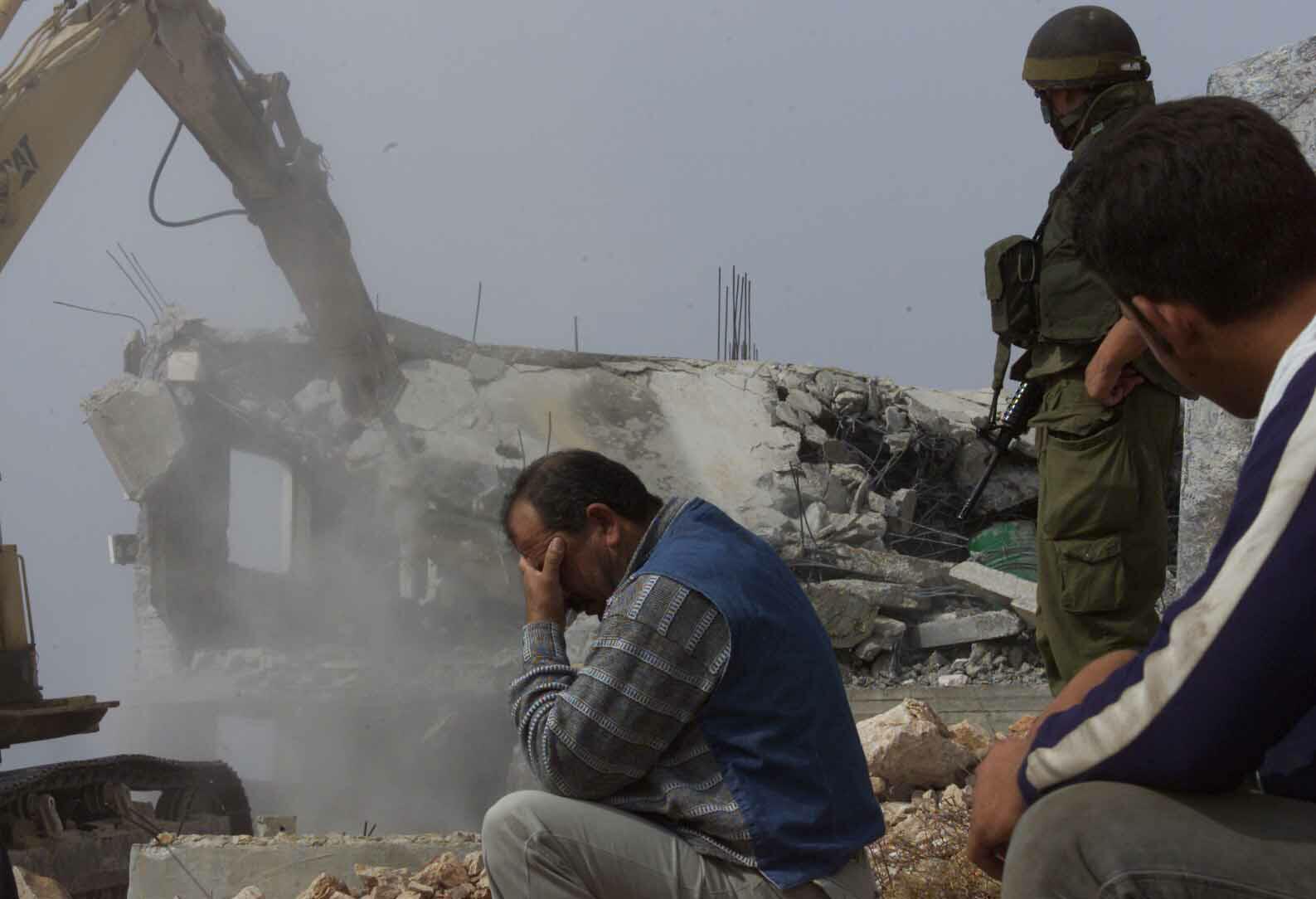 The Israeli military demolishes a Palestinian home